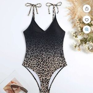 NWT fade/cheetah print/padded bra/ties at shoulder one piece swimsuit. Size L